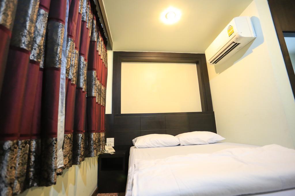 Thara House Hotel Bangkok Szoba fotó